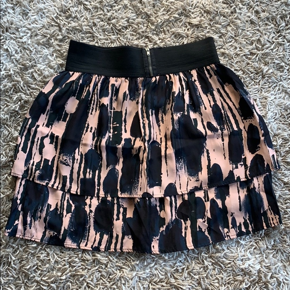 Patterned silk mini skirt with banded waist!